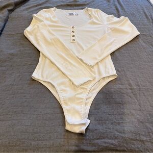Princess Polly White Ribbed long sleeve Bodysuit scoop neck and brown buttons